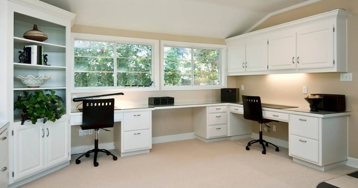 Home office with desk and chairs