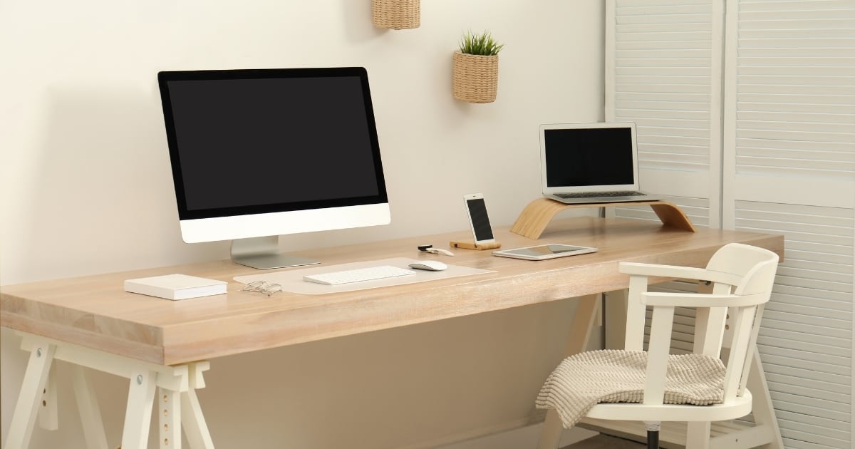 Home office desk with two computers