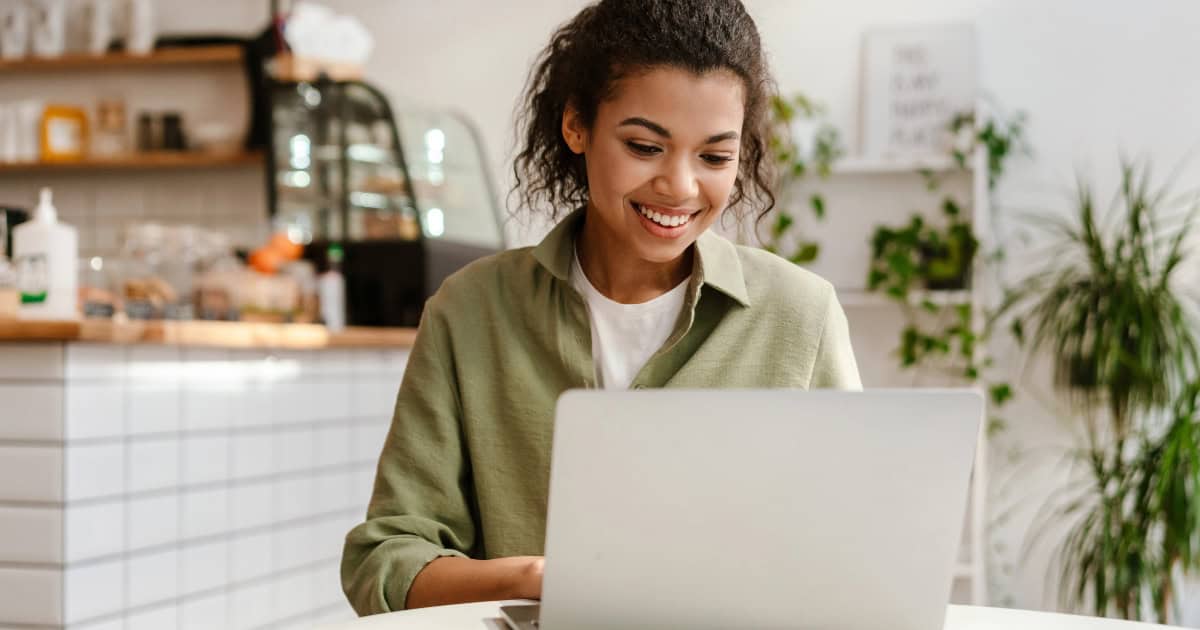 Woman working on a laptop from home