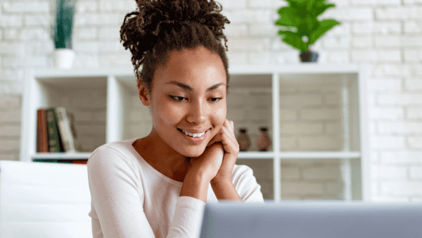 Women working on a laptop from home